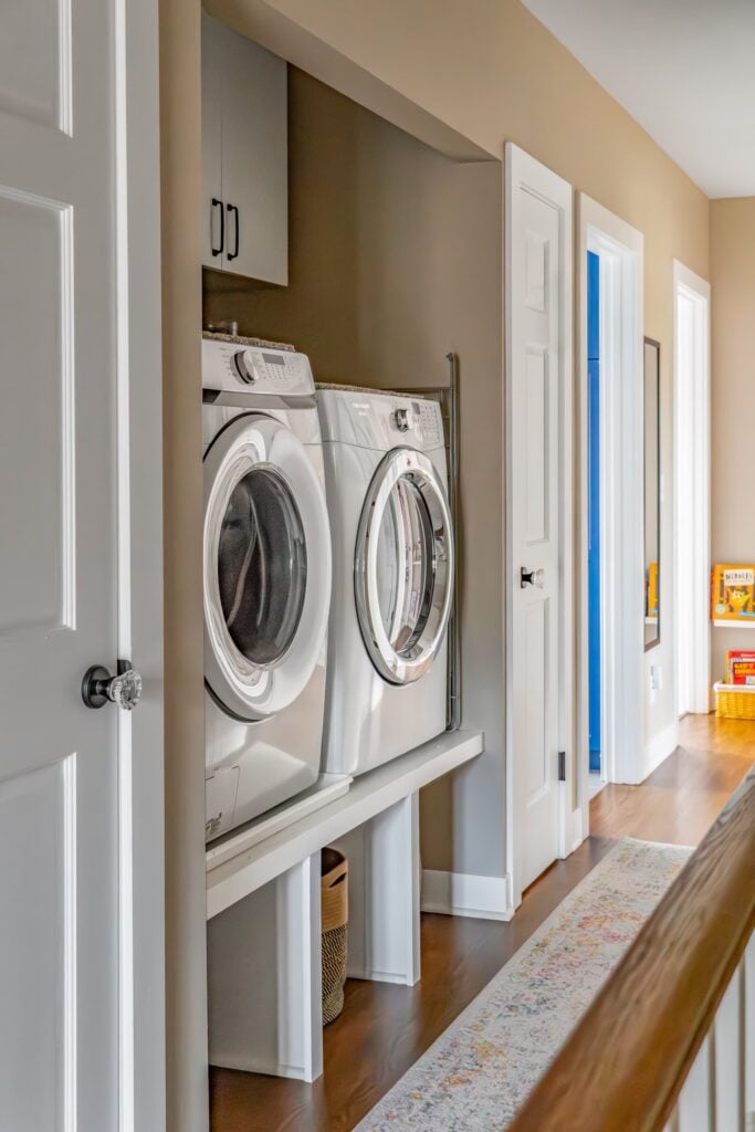 hallway with laundry