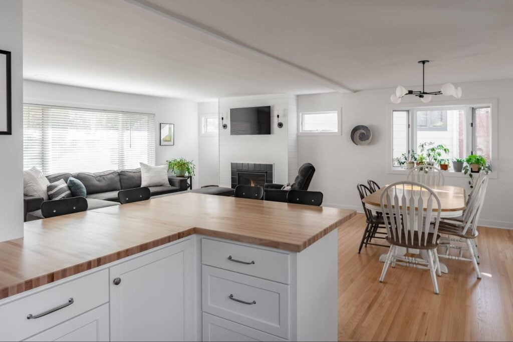 interior of a kitchen and living room area with view of the ceiling