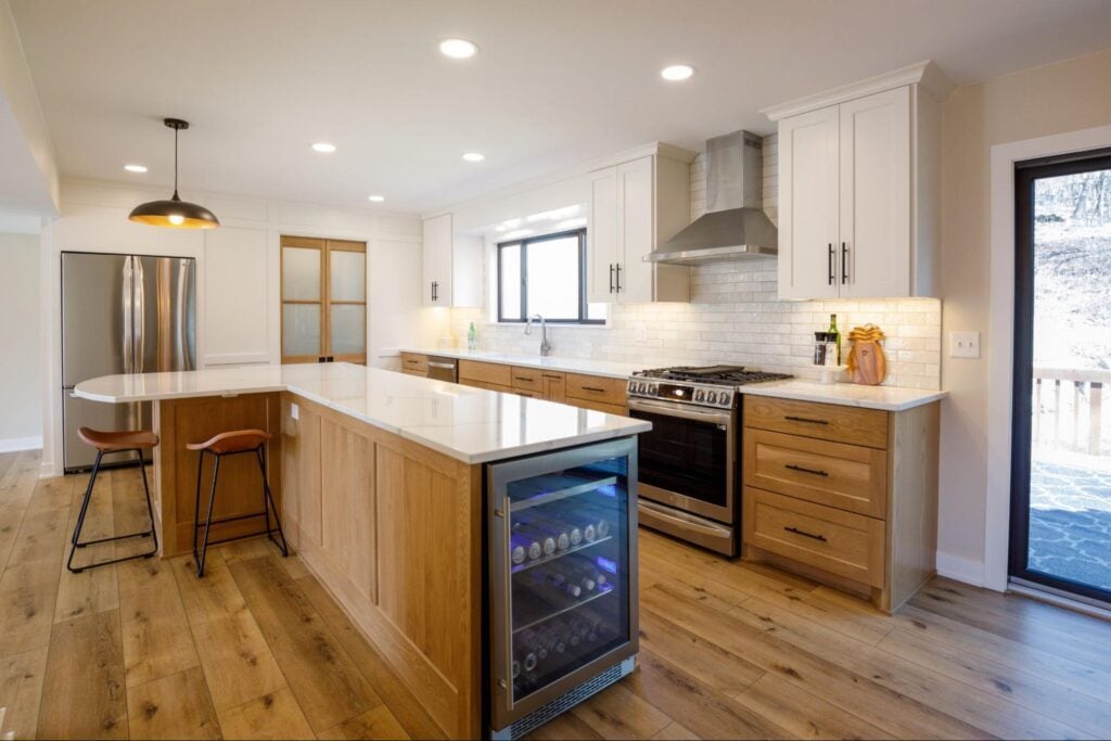kitchen with both wood cabinets and painted white cabinets