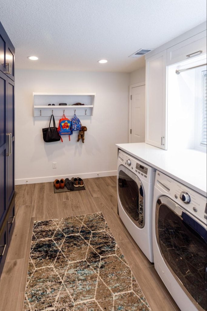 a combination mudroom and laundry room