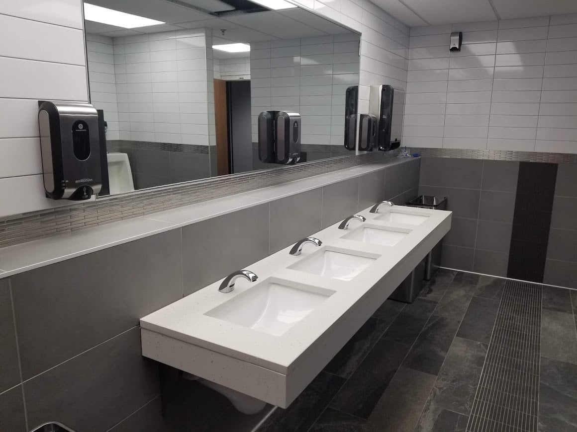 row of sinks in a commercial bathroom