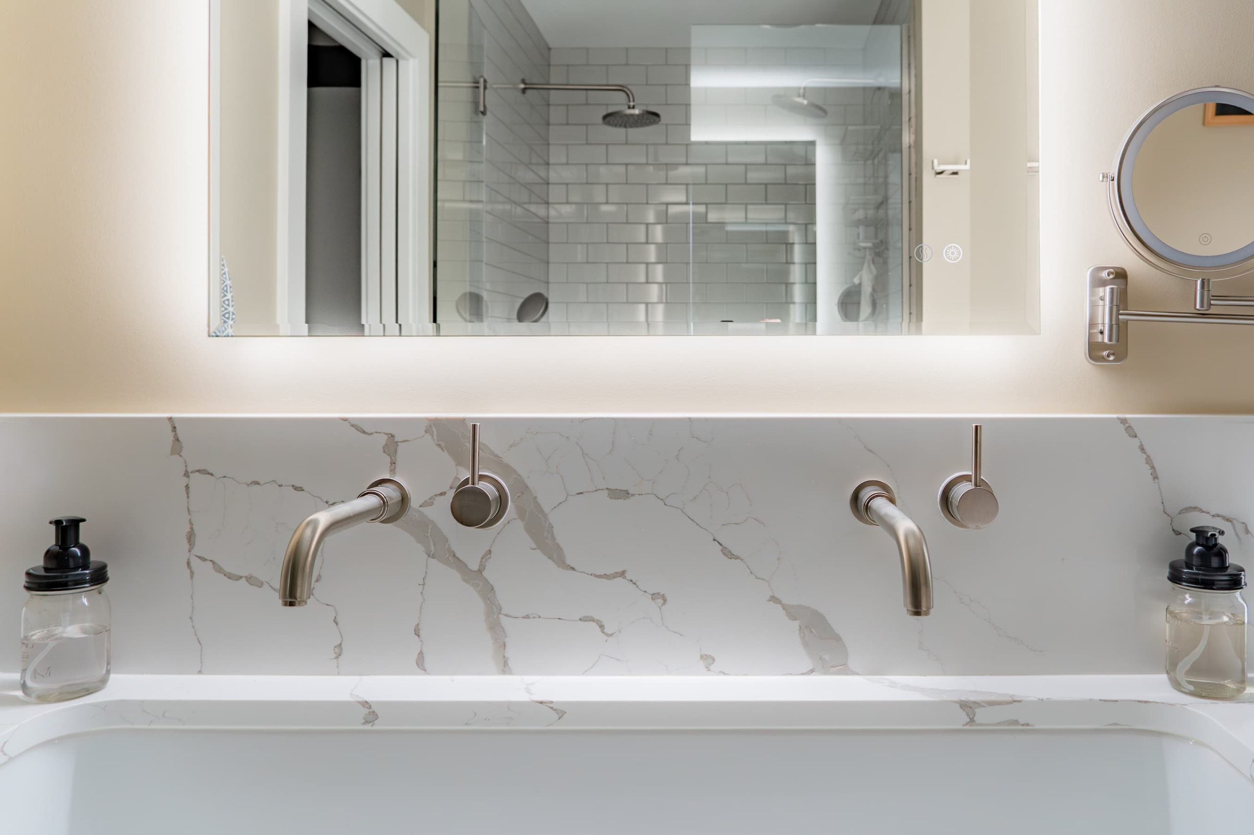 close up of a smart mirror in a bathroom with dimmable lighting
