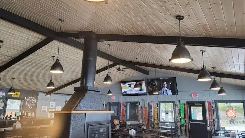 industrial lighting and wood ceiling update in commercial restaurant/bar