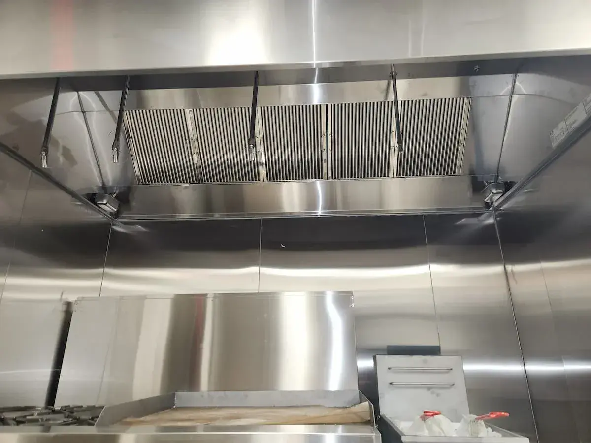 new hood over grill and cook area