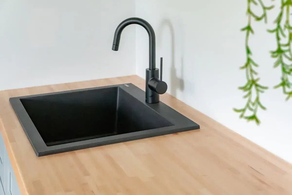 sink close-up in home renovation with sink, counterspace and beverage center in apple valley, mn