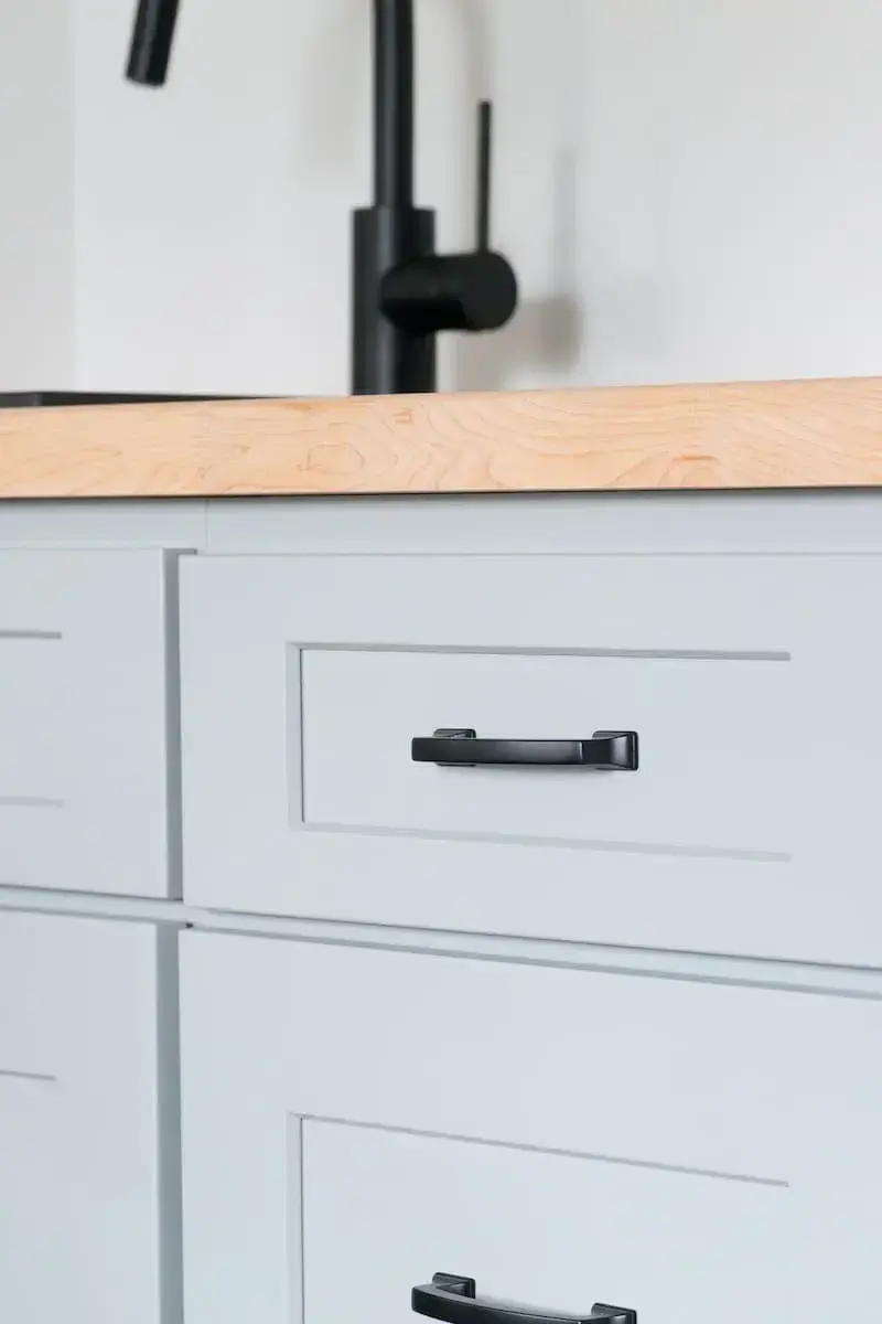 cabinet detail close up in home renovation with sink, counterspace and beverage center in apple valley, mn