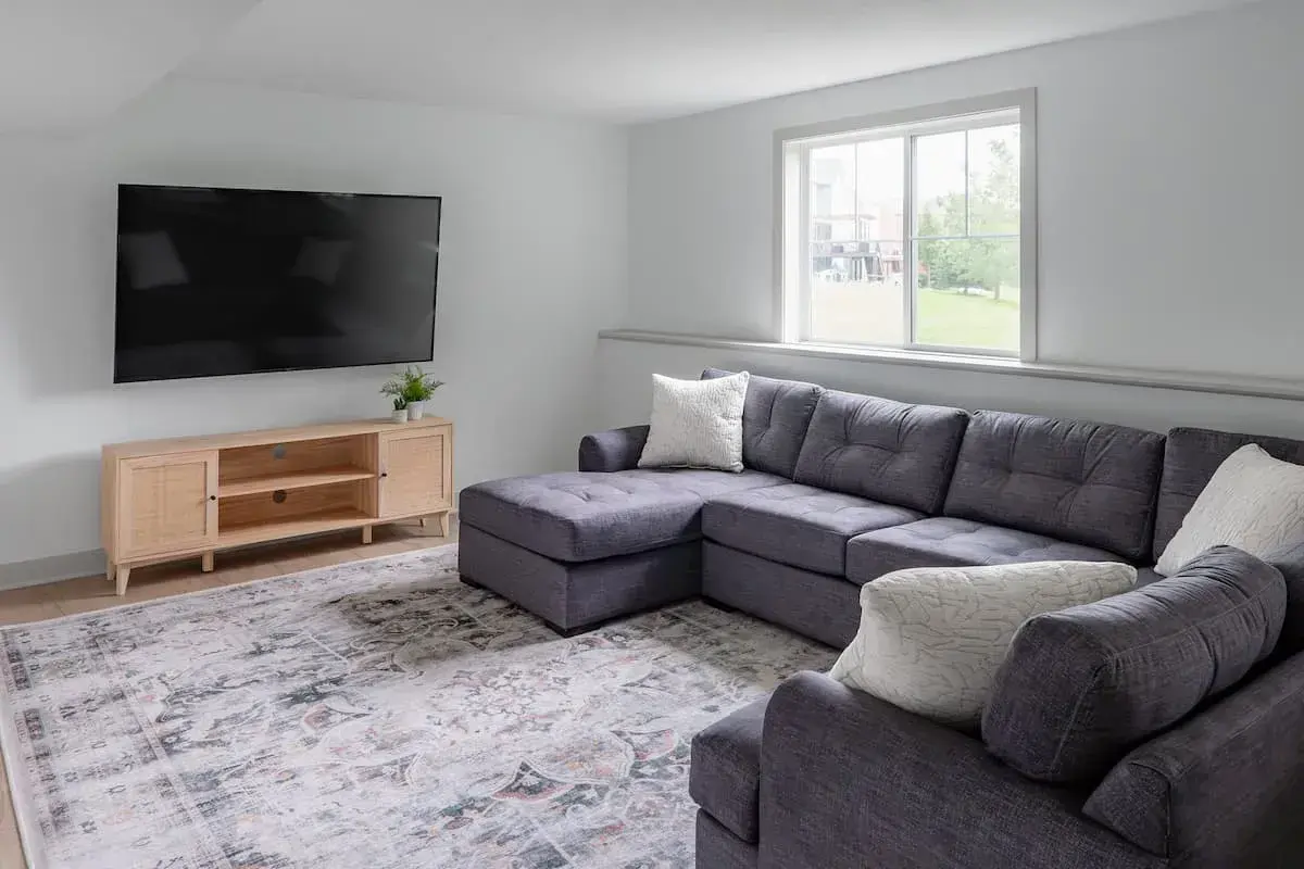 lounge and tv area in basement renovation