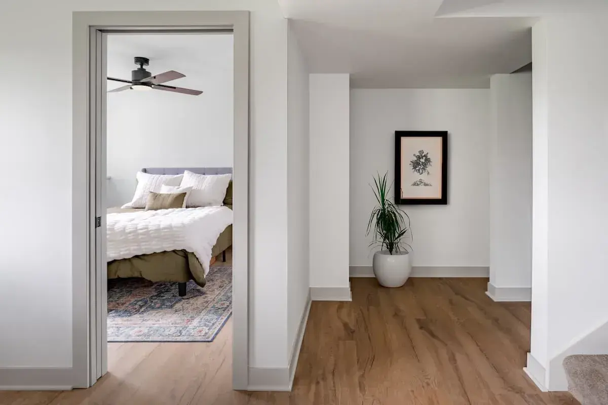 hallway and bedroom view in basement renovation