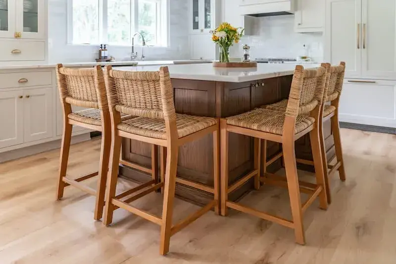 oversize island with glass pendants and wood base