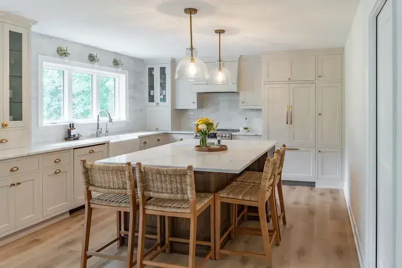 oversize island with glass pendants and antique gold hardware