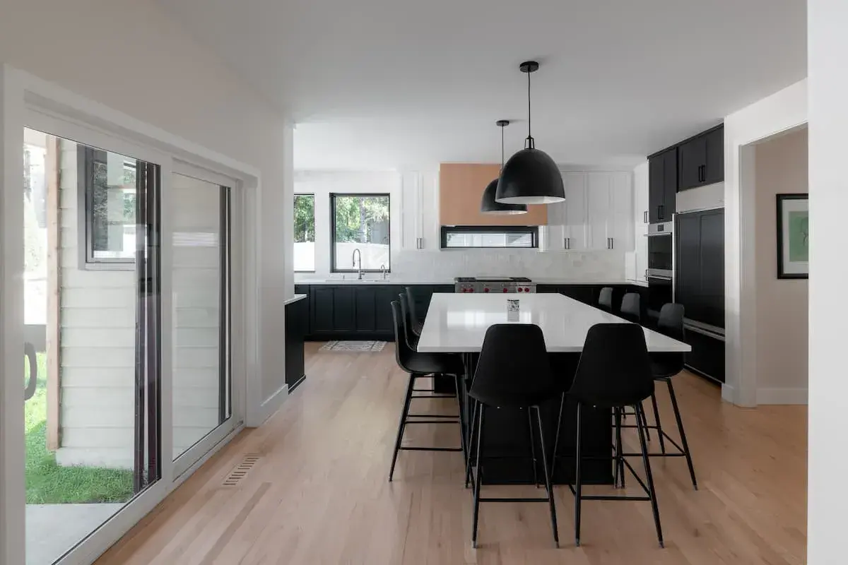 home with beautiful, modern kitchen. Island seating for 8