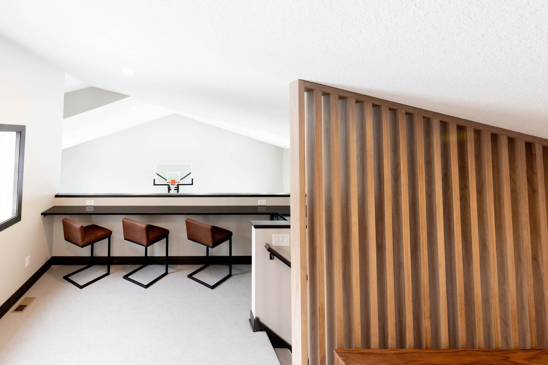 mezzanine area with seating and acoustic paneling