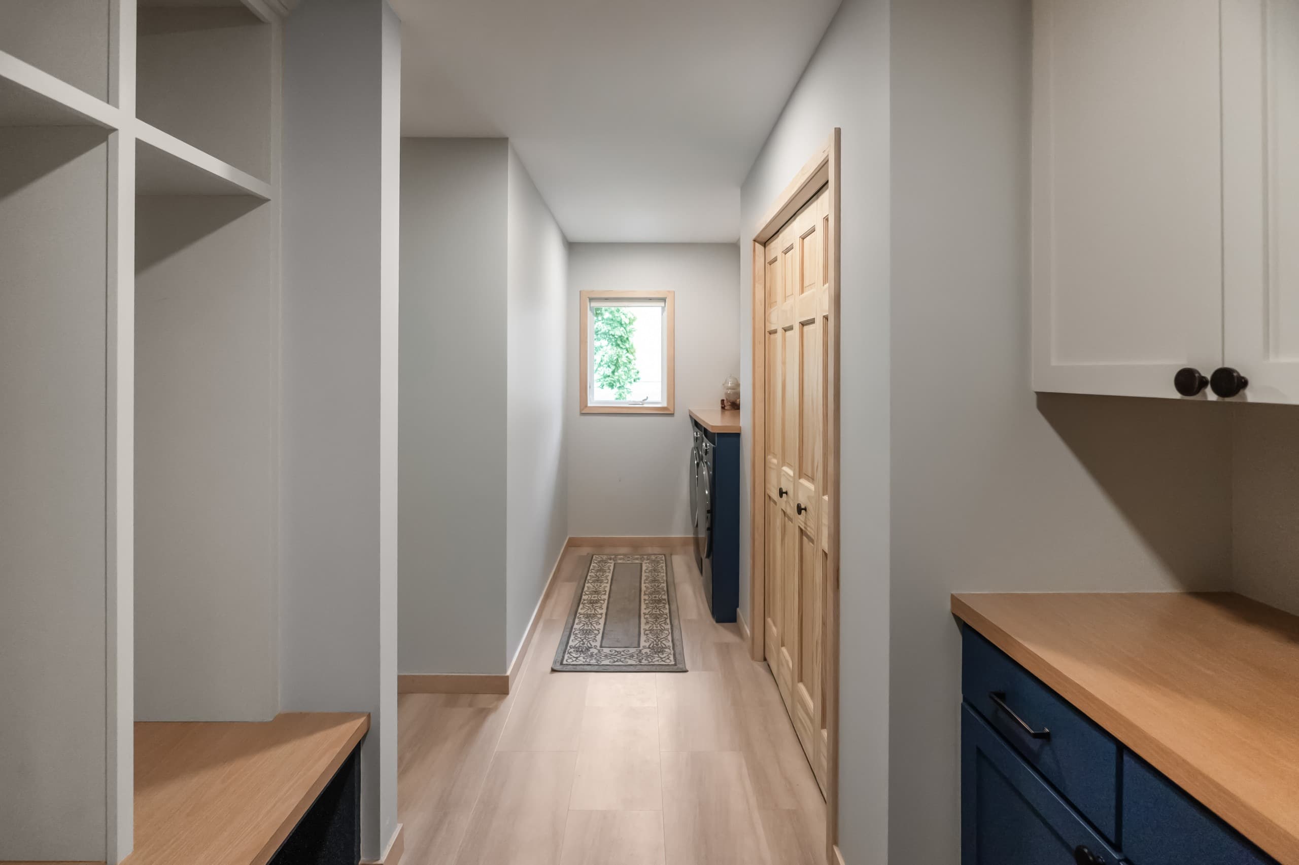hybrid mudroom and laundry room area