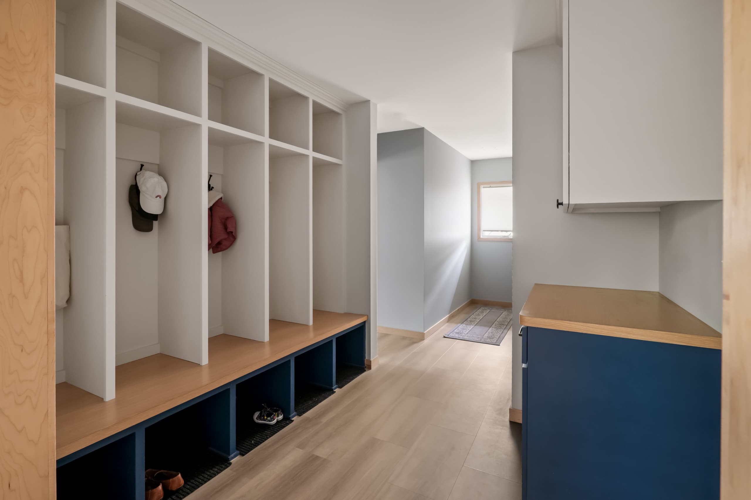 hybrid mudroom and laundry room area
